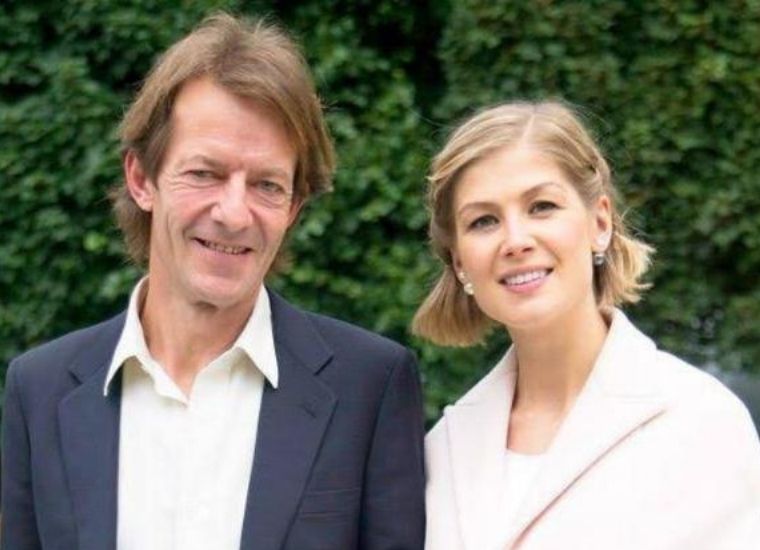 Robie Uniacke with his wife Rosamund Pike